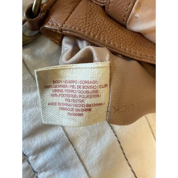 Lucky Brand | Ali Cognac Pebble Leather Flap Crossbody Saddle Bag Tan Tassel - Picture 8 of 12